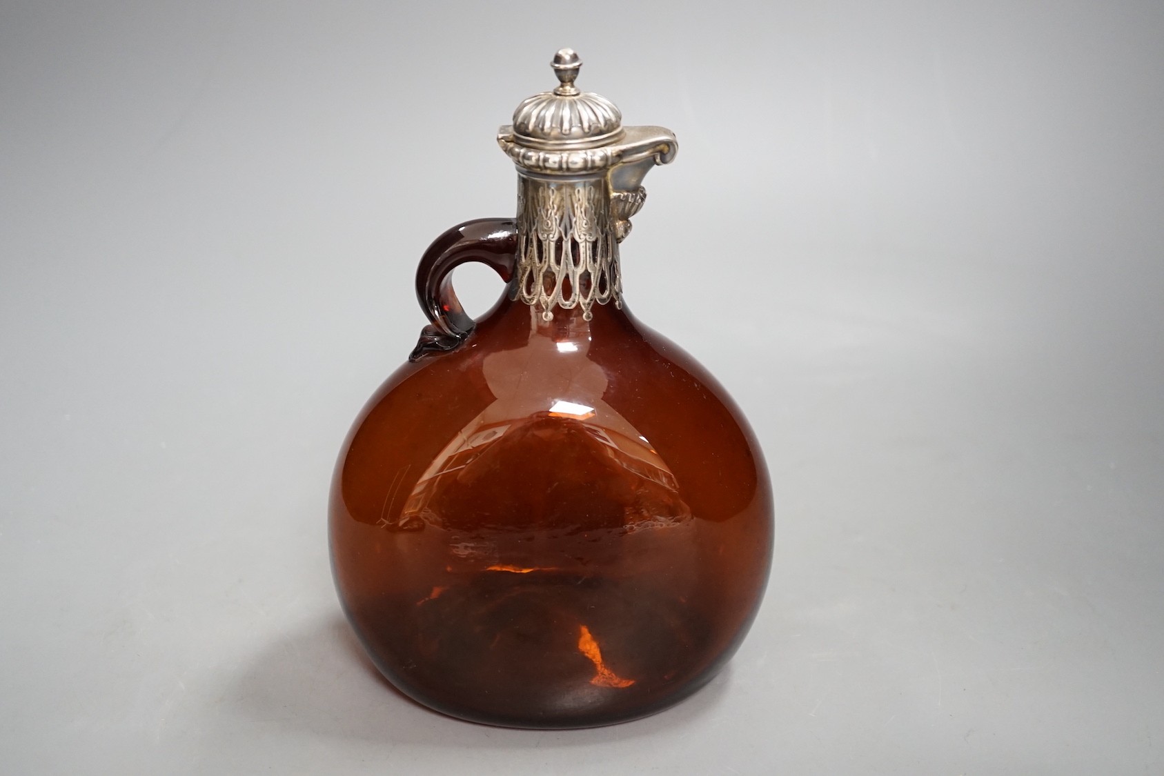 A Victorian silver mounted amber glass hock jug, by George Fox, London 1869, 20cm tall